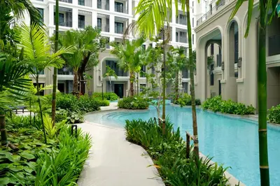 a swimming pool in the middle of a building at The Title Legendary by TVC company in Bang Tao Beach