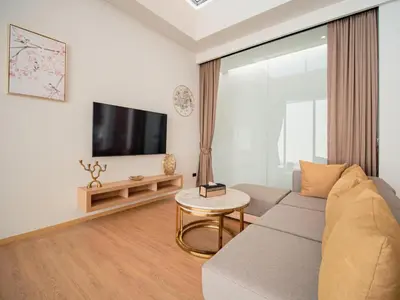 a living room with a couch and a tv at Elegant Aileen 3Bed Pool Villa P3VC8 Naithon in Phuket Town
