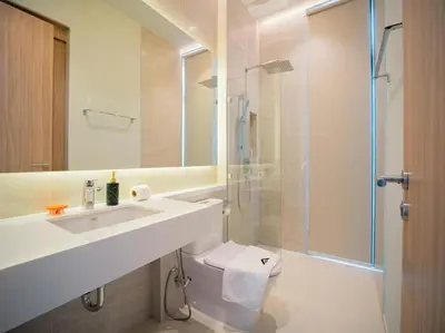 a bathroom with a toilet and a sink and a shower at Elegant Aileen 3Bed Pool Villa P3VC8 Naithon in Phuket Town