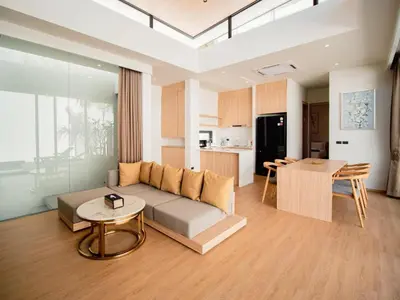 a living room with a couch and a table at Elegant Aileen 3Bed Pool Villa P3VC8 Naithon in Phuket Town