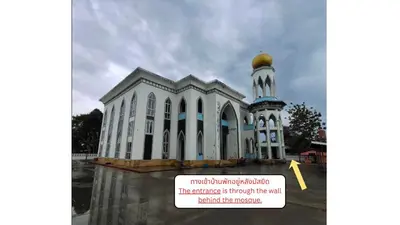 a church with a sign in front of it at Parin House Homestay - Koh Yao Noi in Ko Yao Noi