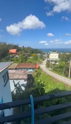 a view of the ocean from the balcony of a house at Patong View by Thainish Res - Accommodation for Rentals in Ban Na Nai
