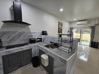 a kitchen with a sink and a counter top at Rawai 4 Bedrooms Private Pool Villa in Rawai Beach