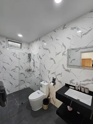 a bathroom with a shark mural on the wall at Rawai 4 Bedrooms Private Pool Villa in Rawai Beach