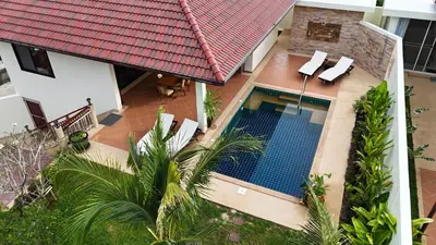 an aerial view of a house with a swimming pool at Lai Thai Villa 5 in Rawai Beach