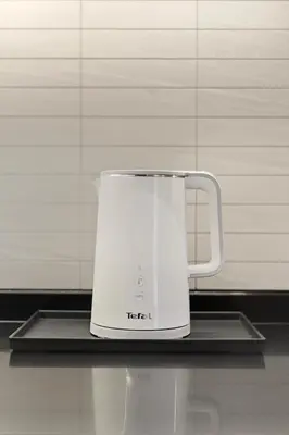 a white tea kettle sitting on a counter at Bangtao The Title Legendary by Phuket Sabay Rent I302 in Bang Tao Beach