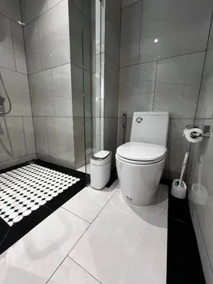 a bathroom with a toilet and a shower at Title Legendary suite pool view E301 in Phuket
