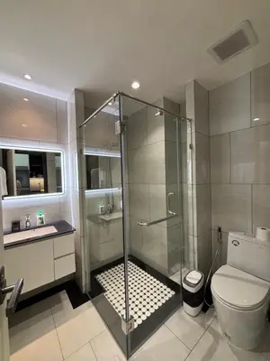 a bathroom with a shower and a toilet at Title Legendary suite pool view E301 in Phuket