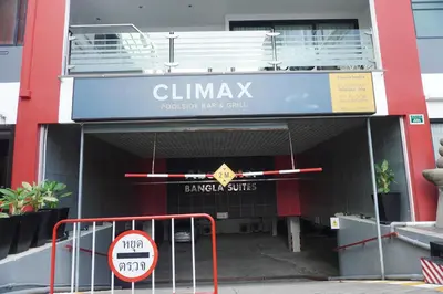a building with a sign that reads bar grill at Patong Condo Tub, Roof Pool & 2-min to Beach in Patong Beach