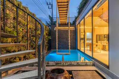 a pool in the middle of a house at V280 If You Need Luxury This Is The Place Fully Smart in Ban Saiyuan (1)