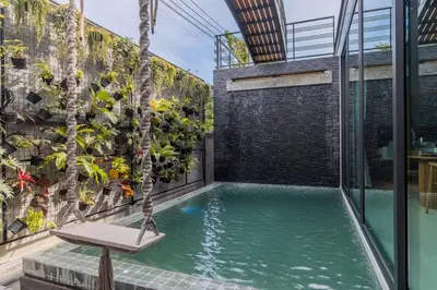 an indoor pool with a swing in a house at V280 If You Need Luxury This Is The Place Fully Smart in Ban Saiyuan (1)