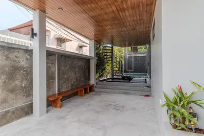 an indoor patio with a bench and a shower at V280 If You Need Luxury This Is The Place Fully Smart in Ban Saiyuan (1)