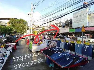 a market with merchandise on display on a city street at FanRoomGroundFlNonehotshower in Ban Ket Ho