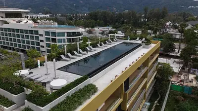 an overhead view of a building with a swimming pool at Premium 1BR Laguna, 200m to the Beach in Bang Tao in Bang Tao Beach