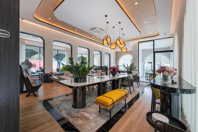 a dining room with a table and chairs at Delos 1BR Suite — The Title Legendary BangTao in Bang Tao Beach