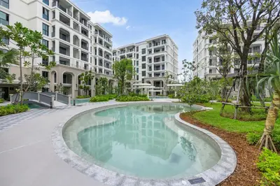 an image of a swimming pool in an apartment building at Delos 1BR Suite — The Title Legendary BangTao in Bang Tao Beach