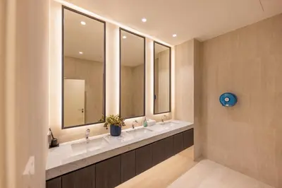 a bathroom with a row of sinks and mirrors at Delos 1BR Suite — The Title Legendary BangTao in Bang Tao Beach