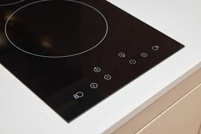 a close up of a black panel with circles on it at Bellevue Lagoon by My Home Phuket in Laguna Phuket