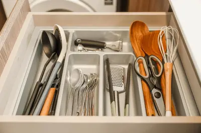 a drawer filled with kitchen utensils at Condo Close to the Beach and City Center in Laguna Phuket