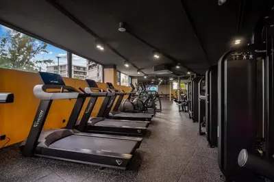 a row of treadmills on a bus at Hydra 1BR Suite at Kora Beach Resort in Layan Beach