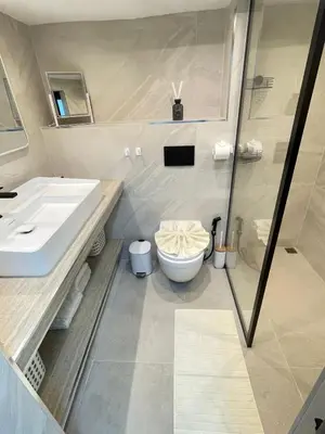 a bathroom with a toilet and a sink at Seaview paradise in Patong Beach