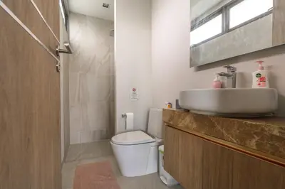 a bathroom with a sink and a toilet at V217 Brand New 3BR Villa Near Beach & Boat Avenue in Thalang