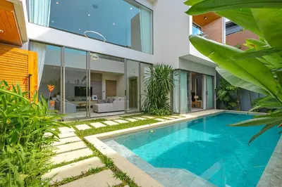 a swimming pool in the backyard of a house at V217 Brand New 3BR Villa Near Beach & Boat Avenue in Thalang