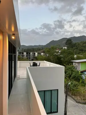 a view from the balcony of a house at Luxury 4BR Private Pool Villa Sunset Rooftop in Phuket Town