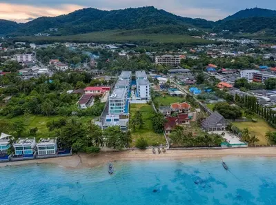 an aerial view of a resort on a beach at C109 Beachfront Seaside Escape Pool Access in Ban Saiyuan (1)