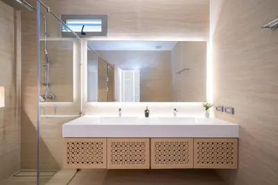 a bathroom with a large white sink and a mirror at Duplex 5 & 4 BR Private Pool Villa - Laguna Phuket in Laguna Phuket