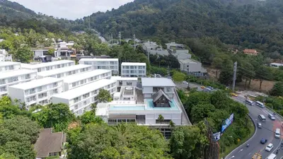 an aerial view of a building in a city at Seavale patong phuket in Patong Beach
