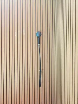 an overhead view of a black toothbrush on a wall at Kathu V pool villa soi Srikor in Ban Kathu