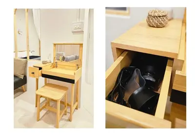 a desk and a table with a guitar in a room at Mango Moon Phuket Art Haus 1 BR Near Central Phuket in Ban Nong Chaeng