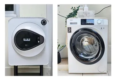 a washing machine is next to a white washer at Mango Moon Phuket Art Haus 1 BR Near Central Phuket in Ban Nong Chaeng