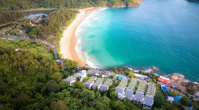 an aerial view of a beach with a resort at The title Aparthotel by Perfect Rawai Holiday Homes in Rawai Beach