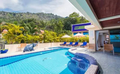 a pool at a resort with a view at Sea View Luxury Villas Kata Beach in Kata Beach