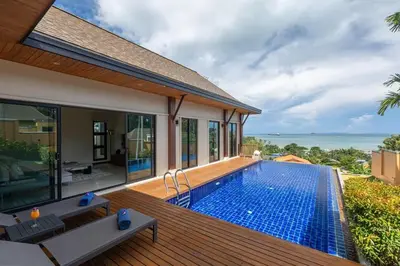 a house with a swimming pool and a deck at Ocean-View 3-Bed Villa Retreat - Ao Yon Hillside in Ban Ao Makham