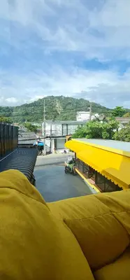 a view of a building with a yellow roof at Sleep On The Clouds in Ban Kata