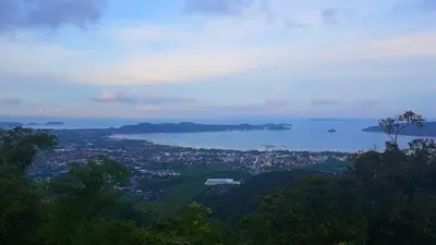 a view of a city and the ocean from a hill at Jasmine Seaview 'C' Friendly Guest House in Ban Saiyuan (1)