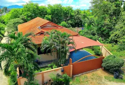 an aerial view of a house with a swimming pool at Jasmine's Bungalow 3 bedroom 2 bathrooms Baby Cots in Ban Saiyuan (1)