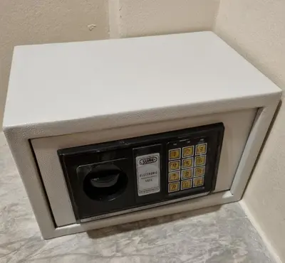 a microwave oven with a white counter top at Jasmine Seaview 'A1' Friendly Guesthouse in Ban Saiyuan (1)