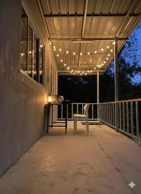 a porch with a bench and lights on it at Villakrabi center in Klong Muang Beach