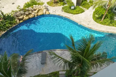 an overhead view of a swimming pool in a resort at Title Halo Lemon Sky Naiyang Gym Pool Hammam in Ban Bo Han