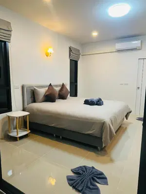 a bedroom with a large bed in a room at Believe Resort At Koh Yao Yai in Ban Hin Kong