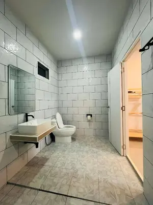 a bathroom with a toilet and a sink at Believe Resort At Koh Yao Yai in Ban Hin Kong