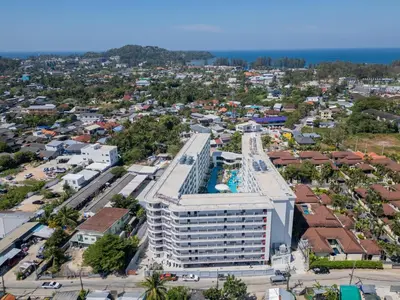 an aerial view of a building in a city at Capri Residence Bangtao in Ban Thalat Choeng Thale