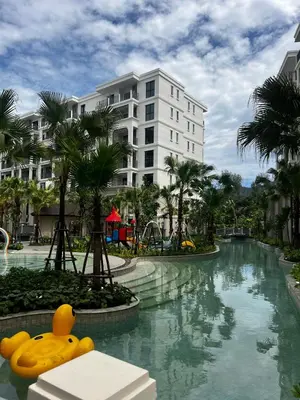 a pool at a resort with a yellow rubber duck in the water at The Title Legendary Bang-Tao Garden Harmony I-406 in Bang Tao Beach