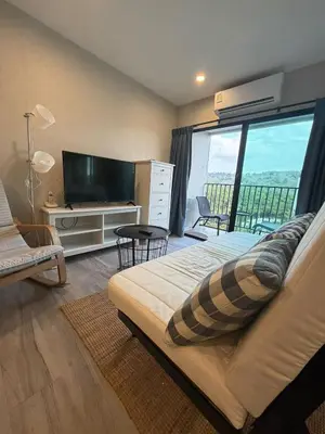 a bedroom with a bed and a large window at 1 BDR 5 Swimming Pool Entire Apt Complex 5 Mins WALK To Naiyang Beach in Phuket