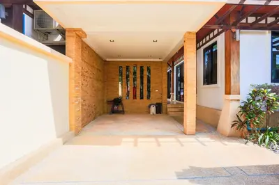 a hallway of a building with a brick wall at 2 bedroom pool villa 250m TO Rawai beach A5 in Rawai Beach