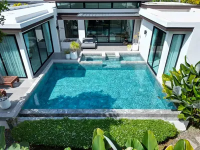 a swimming pool in the backyard of a house at Andara Ao Nang Pool Villa in Ao Nang Beach